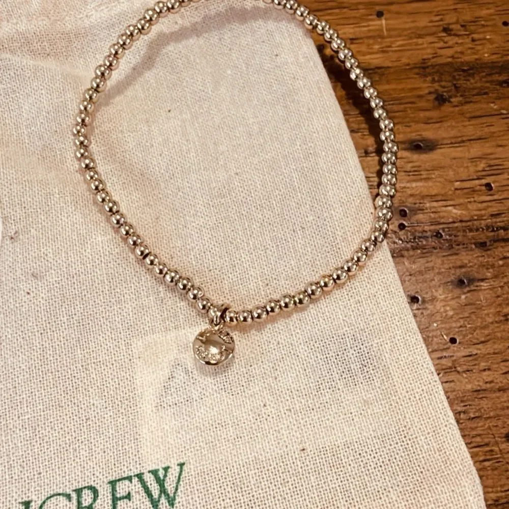 J.crew beaded stretch bracelet with dainty cubic zirconia charm